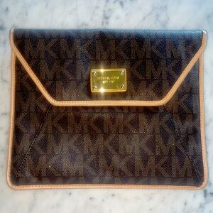 Authentic Michael Kors Brown PVC clutch